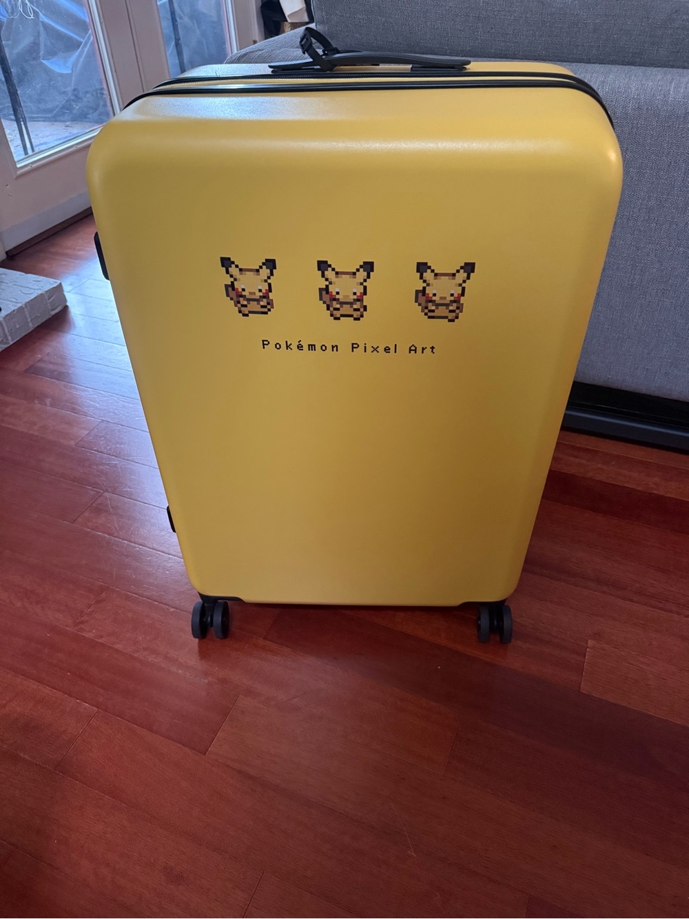 Pokemon Pixel Art Pikachu Hardshell Spinner Suitcase (Japan Exclusive)